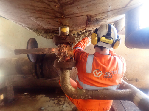 A vertech AICIP In service inspector conducting external visual inspections of a pressure vessel on an offshore FPSO as part of a topside inspection campaign.