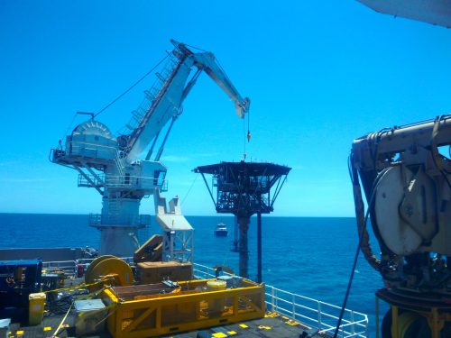 The chervil fixed platform topsides being lifted off by a crane as part of a Decommissioning project.