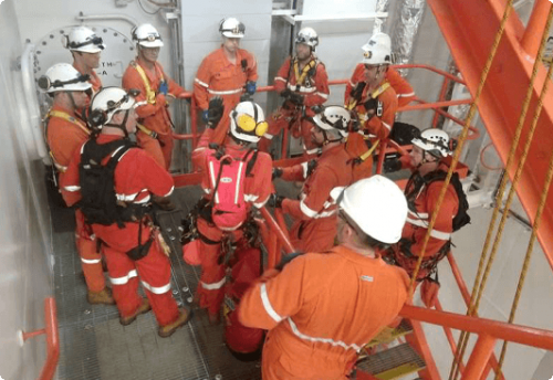 the Vertech rope access, confined space rescue team completing a pre deployment briefing.