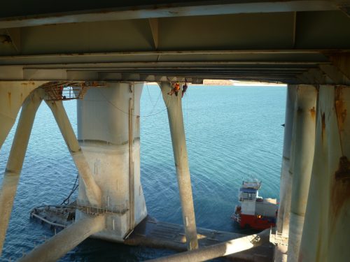 A Vertech rope access special survey team conducting a five-yearly SPS survey on the underside of a semi-submersible drill rig