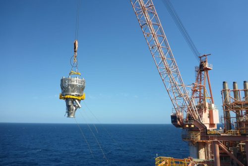 The new flare tip is being hoisted up to be installed on Goodwyn Alpha.