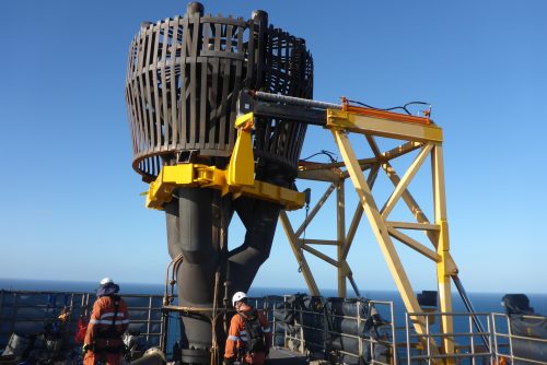 An image of the old flare tip being lifting on a custom frame as part of the GWA Flare Tip Replacement campaign