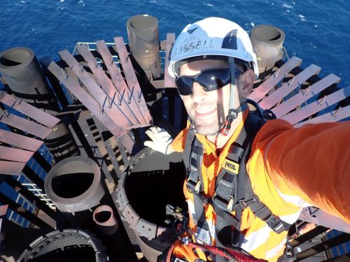 A vertech technician takes a selfie on top of a flare tip on the Goodwyn alpha platform.