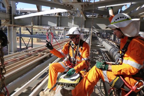 Vertech IRATA rope access AICIP and NDT inspection team conducting pressure piping inspections in a pipe rack including close visual inspections on Karratha Gas Plant (KGP).loading=
