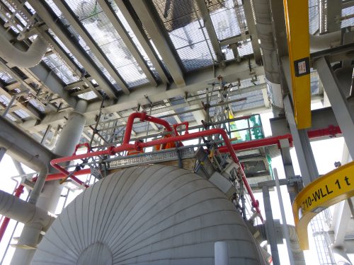 An underside shot of the two vertech technicians.