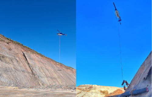 Two images spliced together showing a helicopter lowering a roll of TECCO mesh on rope to 2 IRATA rope access technicians on a sloped rockface with a clear blue sky in the background.