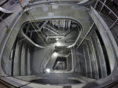 The inside of the FPSO shows stairs going down several levels.