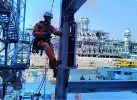 An IRATA rope access mechanical fitter conducting specialist services as part of an LNG construction project for Inpex in Darwin, Australia.