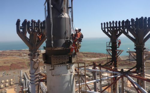 An image of Vertech rope access rigggers, mechanical fitters and rope access inspectors on the Pluto lNG flare tip as part of a project. An image of Vertech rope access rigggers, mechanical fitters and rope access inspectors on the Pluto lNG flare tip as part of a project.