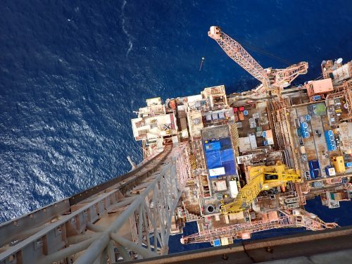 The view of the main FPSO platform from atop the flare tip derrick.