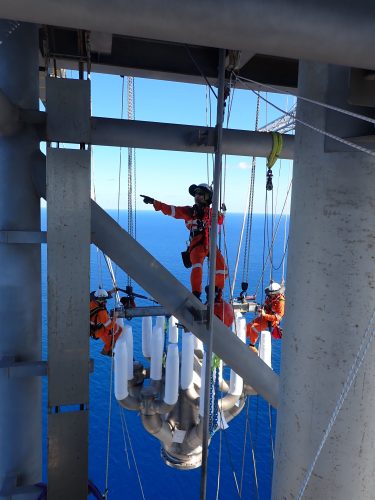 Three Vertech IRATA rope access, Mechanical and rope access riggers are hauling the new flare tip into place on the Ichthys Venturer FPSO for Inpex.