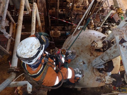 A rope Access AICIP & NDT inspector conducting compliance inspections to AS 3788 on an FPSO.