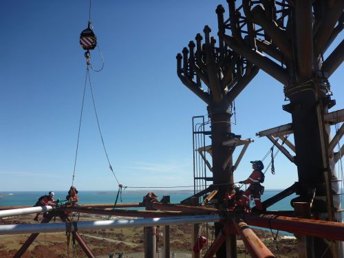 A Vertech rope access technician repairs a flare at the Pluto LNG facility.