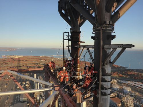 A vertech rope access technician repairs a flare at the pluto LNG facility.