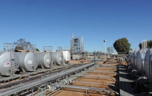 A row of fuel tanks at an oil refinery in Eromanga.