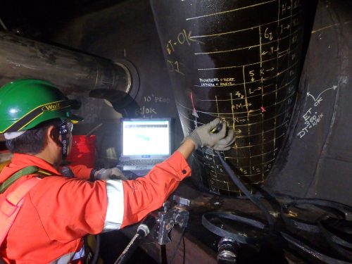 Non-destructive testing is being carried out on a pipe within the RTM FPSO.