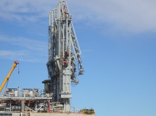 Vertech IRATA rope access personnel conducting Marine loading arm (MLA) maintenance, inspection and repair on an LNG facility in karratha