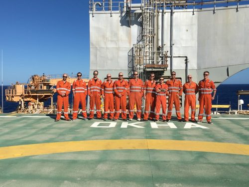 The vertech team poses for a photo onboard the Okha FPSO.