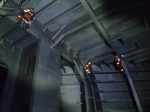 Three Vertech IRATA Rope Access technicians conduct testing on the ceiling of an FPSO hull.