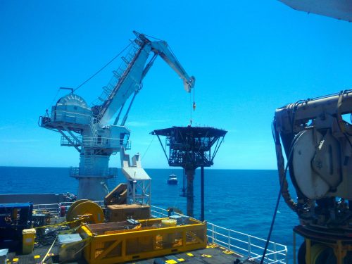 The chervil fixed platform topsides being lifted off by a crane as part of a Decommissioning project