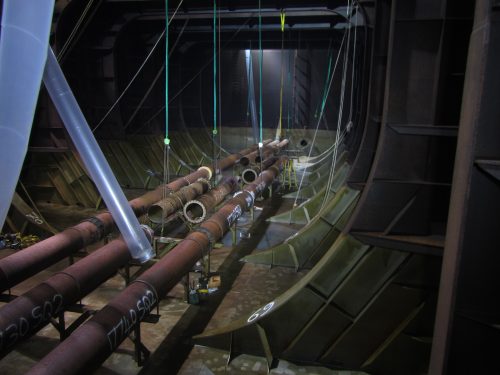 An image of the Marine piping within a FPSO's tanks being replaced and repaired by vertech rope access tradesmen