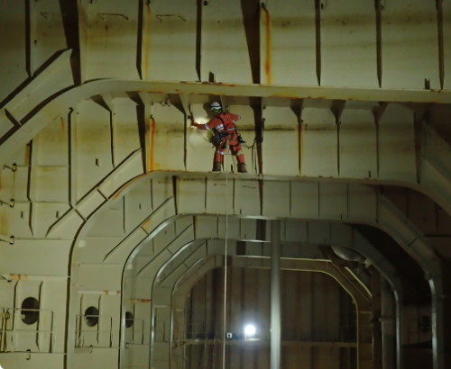 A Vertech marine class inspector conducting NDT and visual inspections on an FPSO tank.