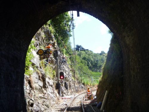 A rope access geotechnical and inspection team is conducting slope stabilisation, bridge inspection, concrete inspection, and repair.